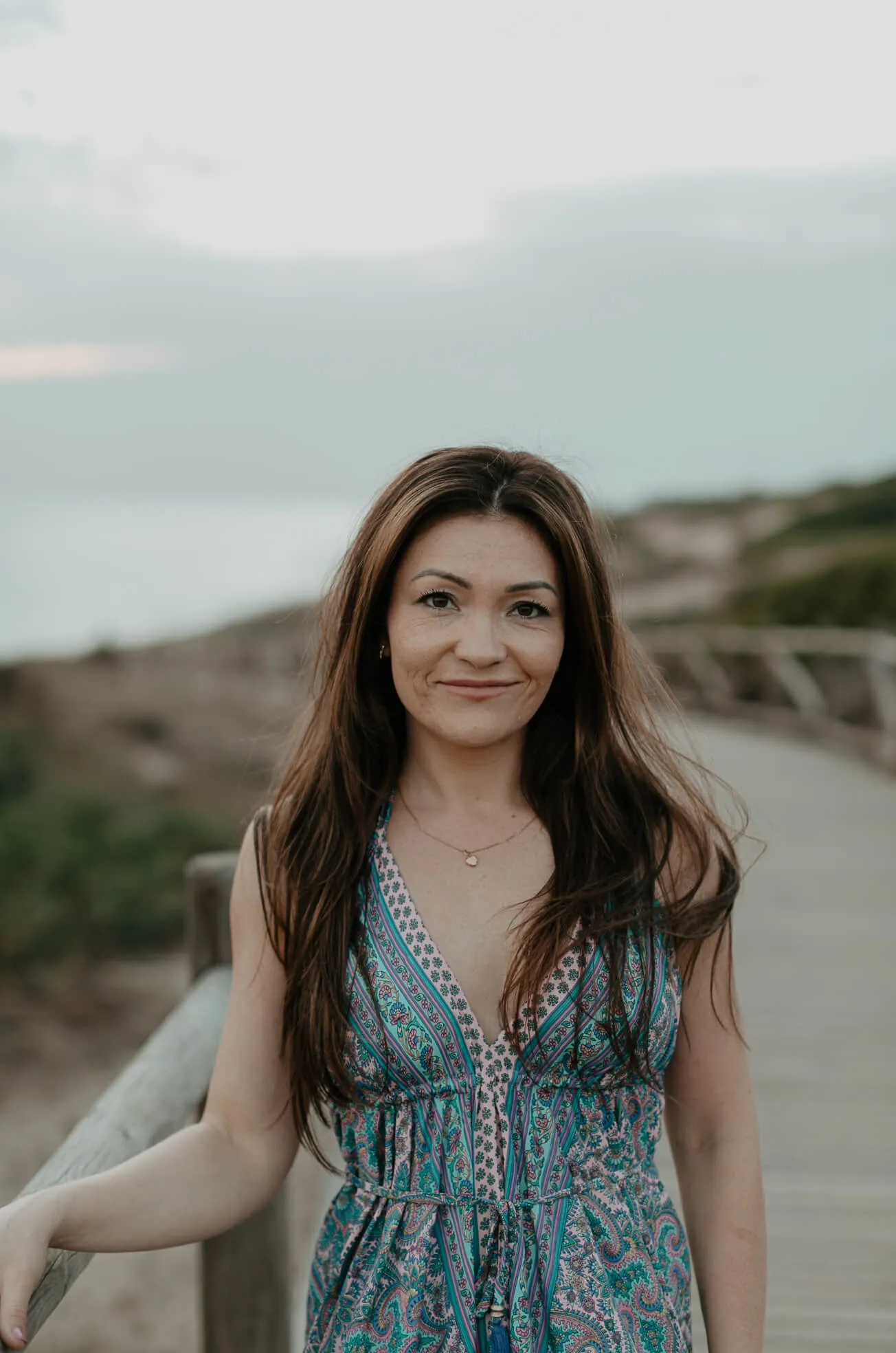 woman smiling on pier