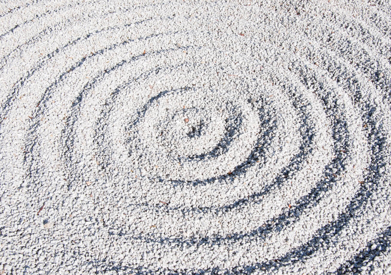 circle patterns in white sand